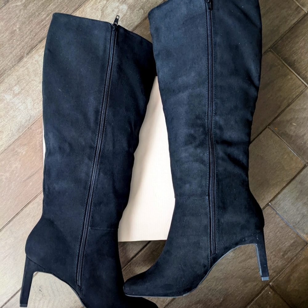 NIB! Be casual or dressy ready in these stylish black heeled boots.
